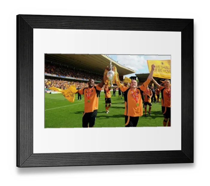 Framed Print : Wolverhampton Wanderers: George Elokobi and Michael Kightly Celebrate Championship Promotion with the Trophy