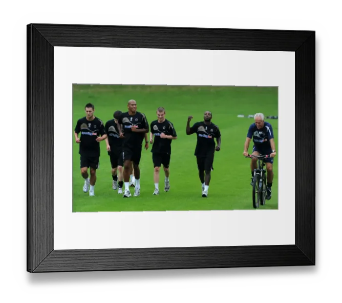 Framed Print : Mick McCarthy's Unique Beginning: Kicking Off Wolverhampton Wanderers Premier League Pre-Season Training on a Bicycle (2009)