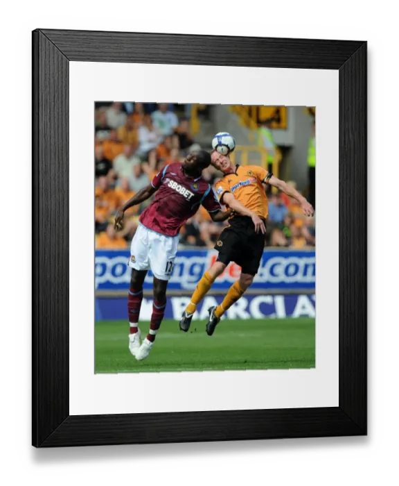 Framed Print : Clash at Molineux: A Battle Between Carlton Cole and Jody Craddock Framed Print : Clash at Molineux: A Battle Between Carlton Cole and Jody Craddock
