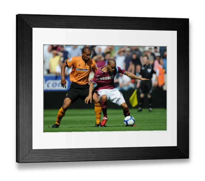 Framed Print : Clash at Molineux: Wolves vs. West Ham United - Henry vs. Dyer: A Premier League Battle Framed Print : Clash at Molineux: Wolves vs. West Ham United - Henry vs. Dyer: A Premier League Battle