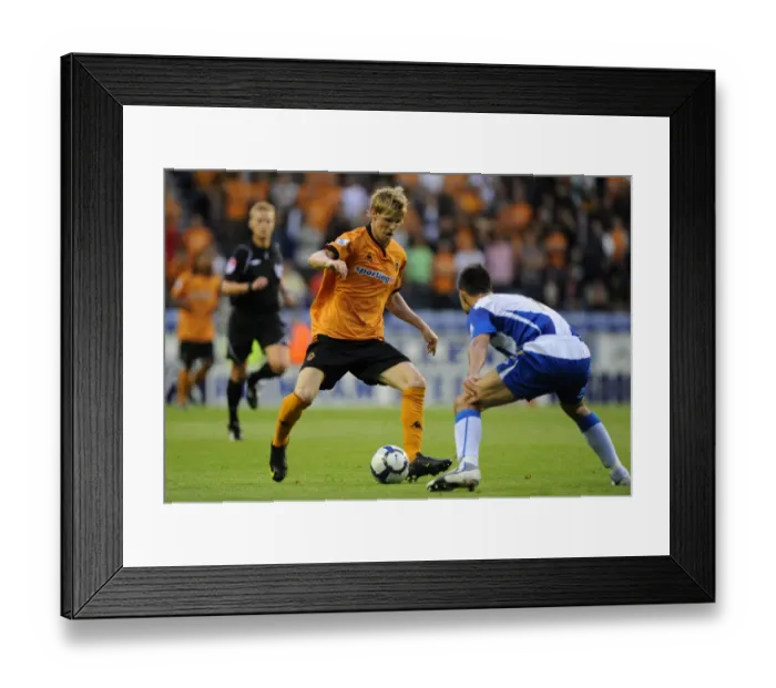 Framed Print : Clash of the Midfield Maestros: Andy Keogh vs Jason Koumas at DW Stadium - Wolverhampton Wanderers vs Wigan Athletic, Barclays Premier League, August 18, 2009 Framed Print : Clash of the Midfield Maestros: Andy Keogh vs Jason Koumas at DW Stadium - Wolverhampton Wanderers vs Wigan Athletic, Barclays Premier League, August 18, 2009