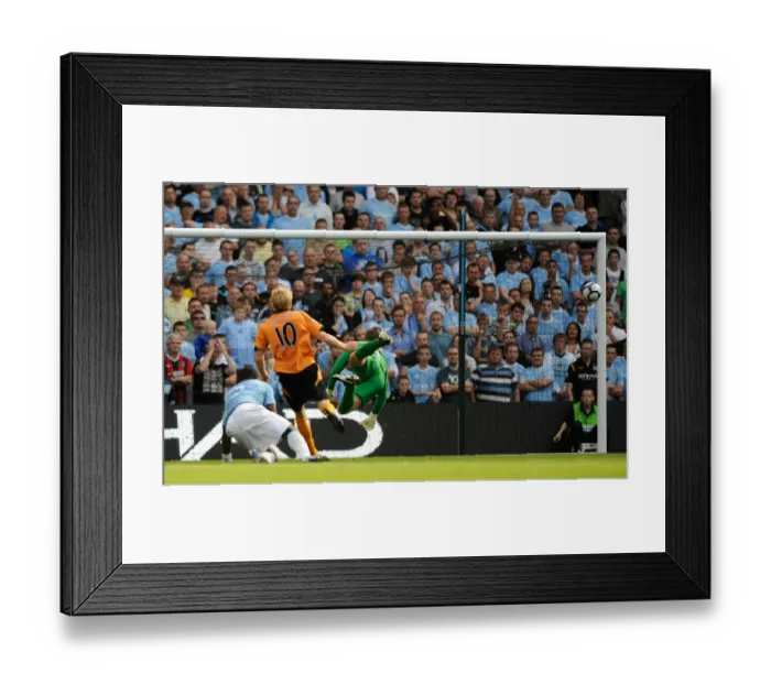 Framed Print : Dramatic Volley at City of Manchester Stadium: Andrew Keogh's Post-Hit Missile for Wolverhampton Wanderers vs. Manchester City, Premier League (August 22, 2009) Framed Print : Dramatic Volley at City of Manchester Stadium: Andrew Keogh's Post-Hit Missile for Wolverhampton Wanderers vs. Manchester City, Premier League (August 22, 2009)