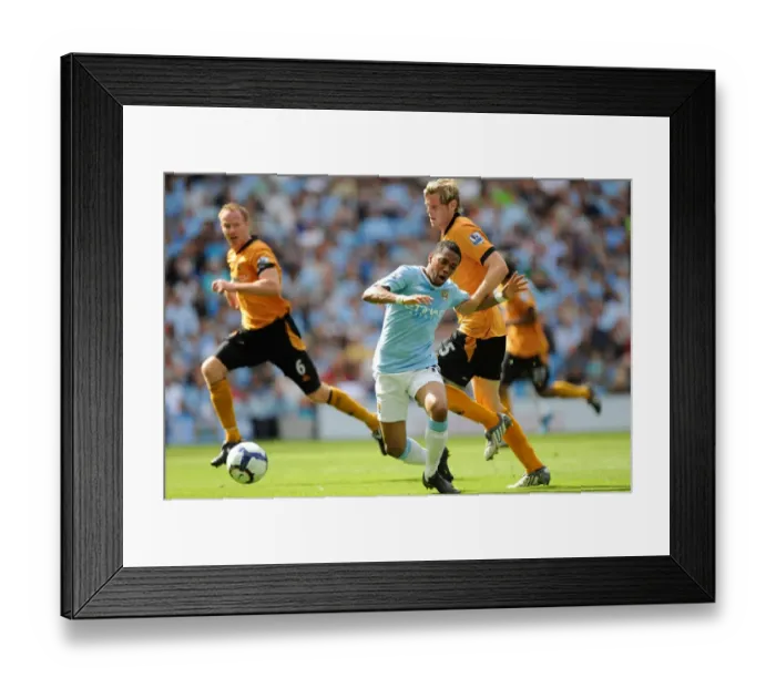 Framed Print : Wolverhampton Wanderers Richard Stearman vs Manchester City's Robinho: A Yellow Card Battle in the 2009 BPL Clash Framed Print : Wolverhampton Wanderers Richard Stearman vs Manchester City's Robinho: A Yellow Card Battle in the 2009 BPL Clash