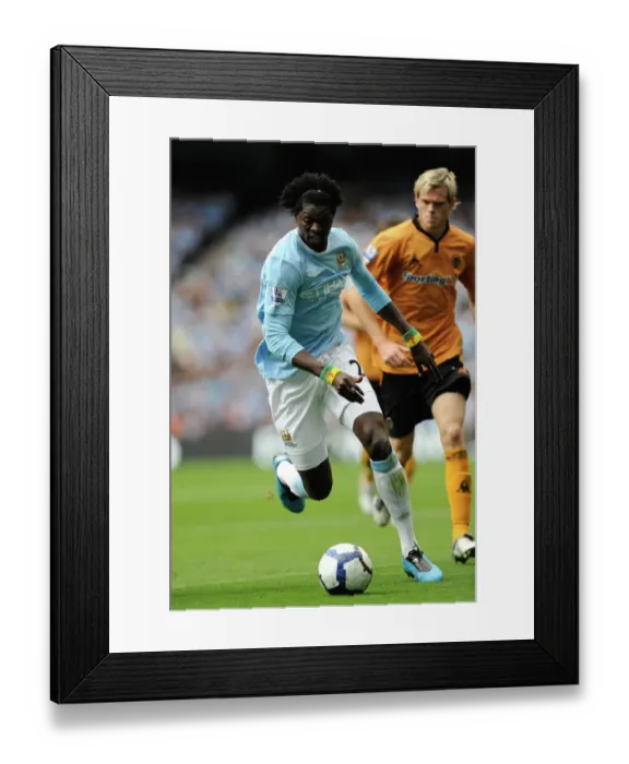 Framed Print : Adebayor's Showdown: Manchester City vs. Wolverhampton Wanderers in Premier League (2009) Framed Print : Adebayor's Showdown: Manchester City vs. Wolverhampton Wanderers in Premier League (2009)