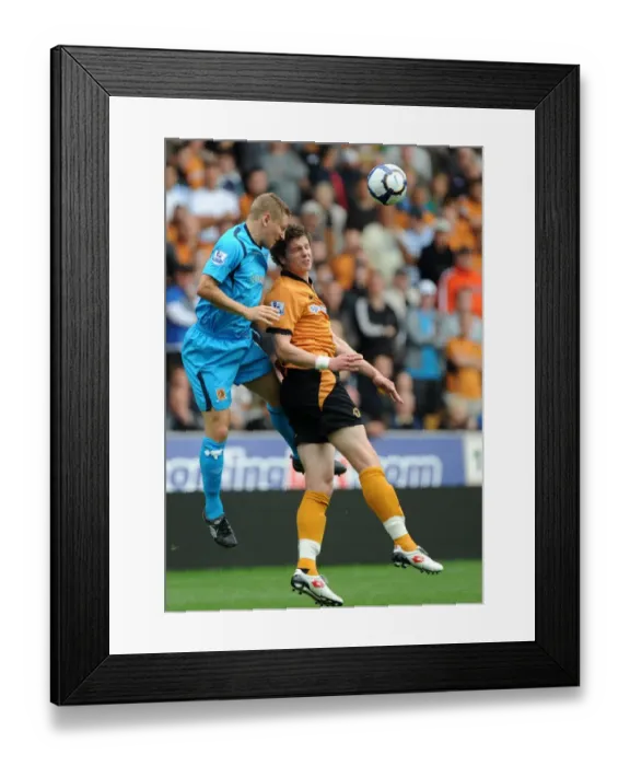 Framed Print : Wolves vs Hull City: A Fierce Encounter Between Greg Halford and Andy Dawson Framed Print : Wolves vs Hull City: A Fierce Encounter Between Greg Halford and Andy Dawson
