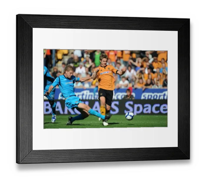 Framed Print : Wolves vs Hull City: A Fierce Encounter Between Kevin Doyle and Michael Turner Framed Print : Wolves vs Hull City: A Fierce Encounter Between Kevin Doyle and Michael Turner