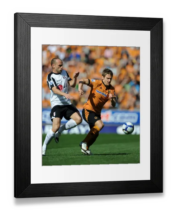 Framed Print : Clash between Kevin Doyle and Danny Murphy: A Intense Moment in Wolverhampton Wanderers vs Fulham Premier League Encounter Framed Print : Clash between Kevin Doyle and Danny Murphy: A Intense Moment in Wolverhampton Wanderers vs Fulham Premier League Encounter