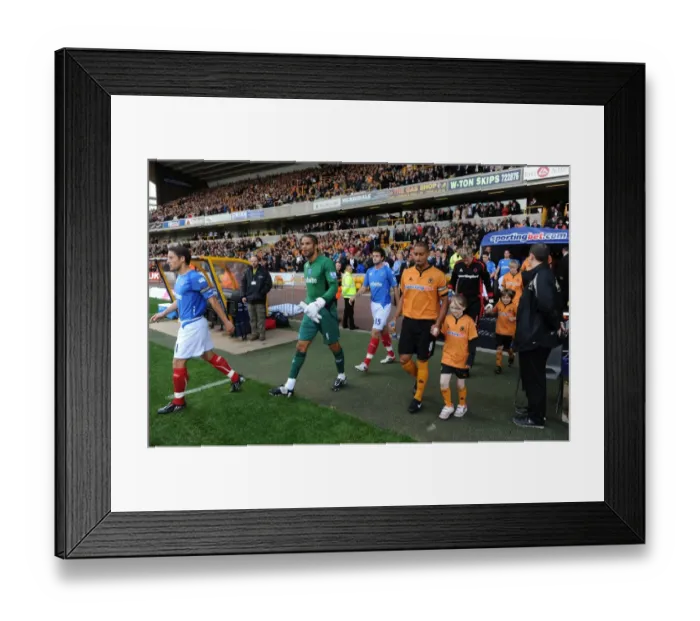 Framed Print : Mascot Showdown: Wolves vs Portsmouth - Barclays Premier League Framed Print : Mascot Showdown: Wolves vs Portsmouth - Barclays Premier League