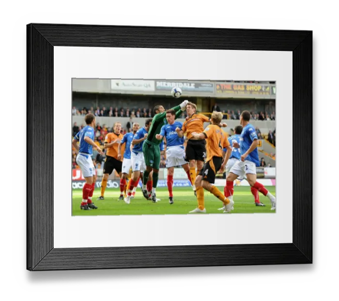 Framed Print : Wolverhampton Wanderers vs Portsmouth: A Premier League Showdown - David James vs. Kevin Doyle