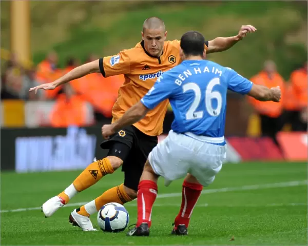 Wolverhampton Wanderers vs Portsmouth: A Premier League Showdown - Michael Kightly vs Tal Ben Haim