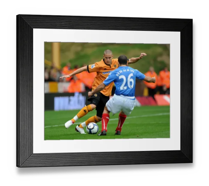 Framed Print : Wolverhampton Wanderers vs Portsmouth: A Premier League Showdown - Michael Kightly vs Tal Ben Haim Framed Print : Wolverhampton Wanderers vs Portsmouth: A Premier League Showdown - Michael Kightly vs Tal Ben Haim