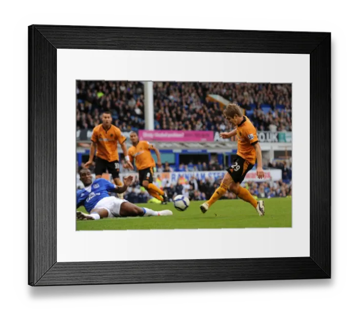 Framed Print : Determined Strike: Kevin Doyle's Premier League Shot Against Everton (Wolverhampton Wanderers)
