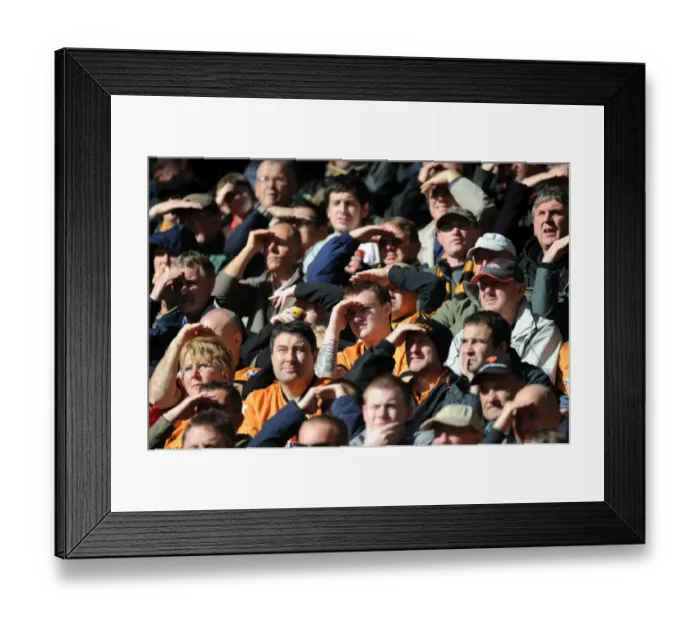 Framed Print : Passionate Premier League Clash: Wolves Fans in Full Roar - Wolverhampton Wanderers vs Aston Villa Framed Print : Passionate Premier League Clash: Wolves Fans in Full Roar - Wolverhampton Wanderers vs Aston Villa
