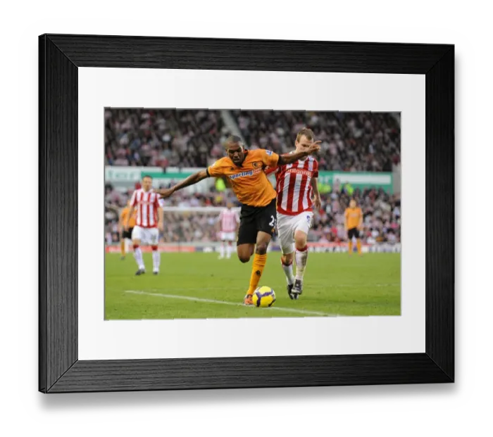 Framed Print : Clash of Titans: Zubar vs. Whelan in the Intense Battle between Stoke and Wolves Framed Print : Clash of Titans: Zubar vs. Whelan in the Intense Battle between Stoke and Wolves