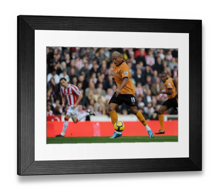 Framed Print : Clash in the Premier League: Chris Iwelumo's Determined Performance - Stoke City vs. Wolverhampton Wanderers Framed Print : Clash in the Premier League: Chris Iwelumo's Determined Performance - Stoke City vs. Wolverhampton Wanderers