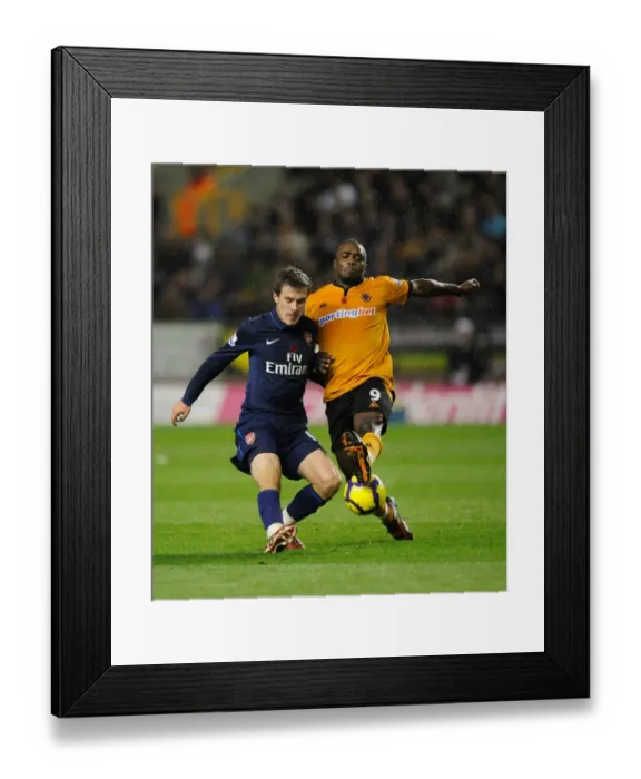 Framed Print : Clash of Stars: Ramsey vs. Ebanks-Blake in Wolverhampton Wanderers vs. Arsenal, Barclays Premier League