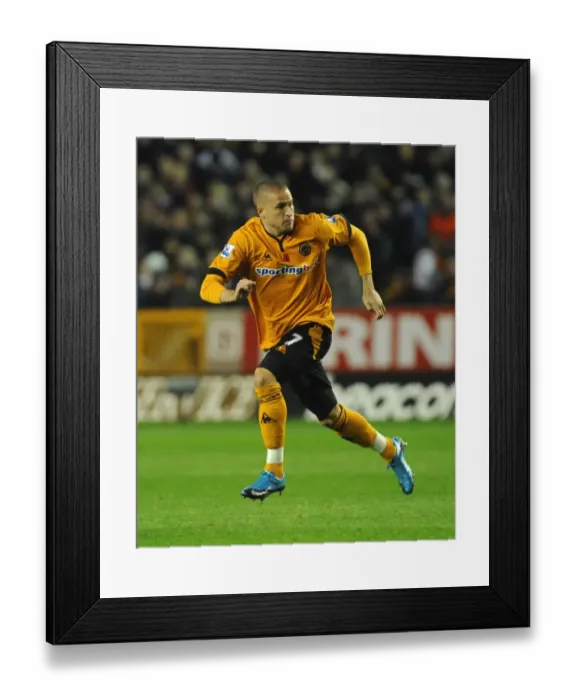 Framed Print : Michael Kightly in Action: Wolverhampton Wanderers vs Arsenal - Barclays Premier League Soccer Match