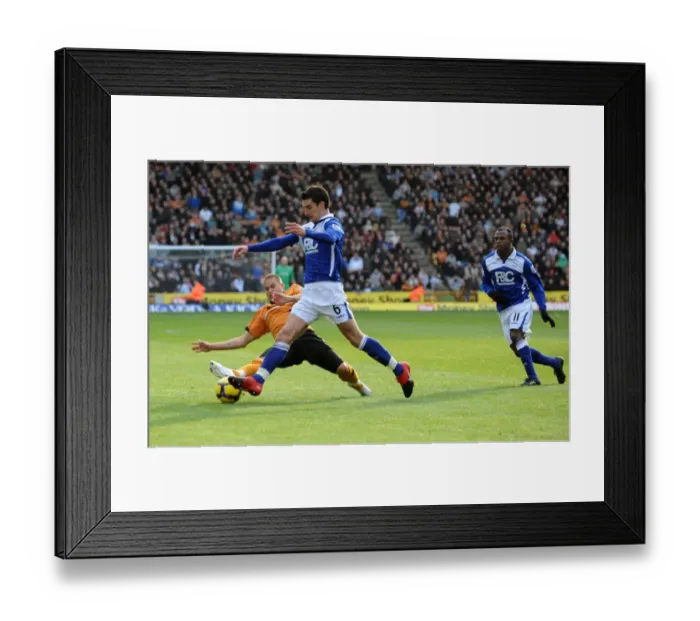 Framed Print : Intense Rivalry: Michael Kightly's Slide Tackle on Liam Ridgewell (Wolverhampton Wanderers vs Birmingham City, Premier League) Framed Print : Intense Rivalry: Michael Kightly's Slide Tackle on Liam Ridgewell (Wolverhampton Wanderers vs Birmingham City, Premier League)