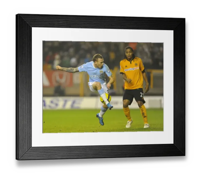 Framed Print : Clash of Titans: Craig Bellamy vs Michael Mancienne - Wolves vs Manchester City in the Premier League Framed Print : Clash of Titans: Craig Bellamy vs Michael Mancienne - Wolves vs Manchester City in the Premier League