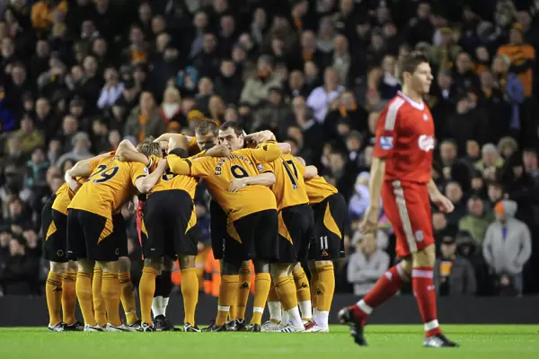 United in Focus: Premier League Showdown - Wolverhampton Wanderers Pre-Match Huddle before Liverpool Clash