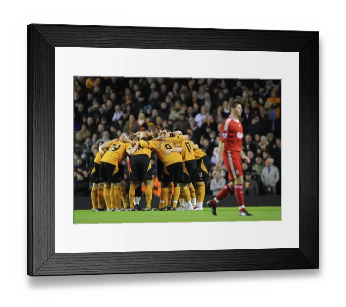 Framed Print : United in Focus: Premier League Showdown - Wolverhampton Wanderers Pre-Match Huddle before Liverpool Clash Framed Print : United in Focus: Premier League Showdown - Wolverhampton Wanderers Pre-Match Huddle before Liverpool Clash