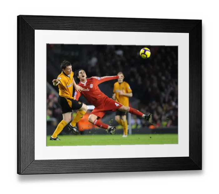 Framed Print : Clash of the Midfield: Kevin Foley vs. Alberto Aquilani - Liverpool vs. Wolverhampton Wanderers, Barclays Premier League