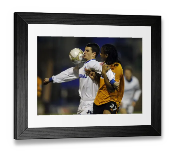 Framed Print : Clash of Titans: Gornell vs. Mancienne - FA Cup Showdown (Tranmere Rovers vs. Wolverhampton Wanderers) Framed Print : Clash of Titans: Gornell vs. Mancienne - FA Cup Showdown (Tranmere Rovers vs. Wolverhampton Wanderers)