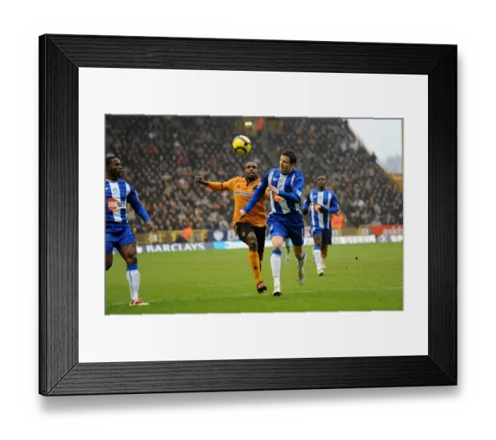 Framed Print : Clash of the Titans: Ebanks-Blake vs Caldwell in the Barclays Premier League - Wolverhampton Wanderers vs Wigan Athletic