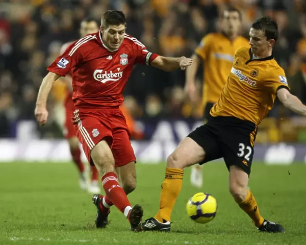 A Clash of Titans: Gerrard vs Foley - Wolverhampton Wanderers vs Liverpool, Barclays Premier League Soccer