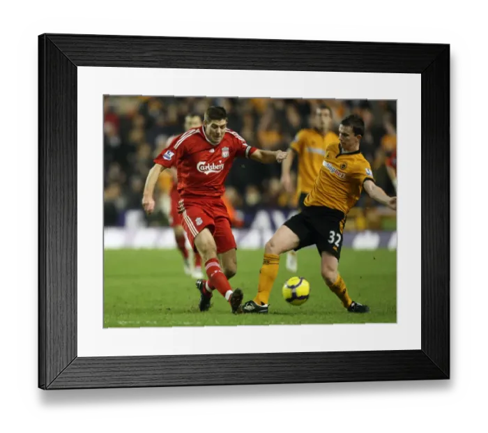 Framed Print : A Clash of Titans: Gerrard vs Foley - Wolverhampton Wanderers vs Liverpool, Barclays Premier League Soccer Framed Print : A Clash of Titans: Gerrard vs Foley - Wolverhampton Wanderers vs Liverpool, Barclays Premier League Soccer