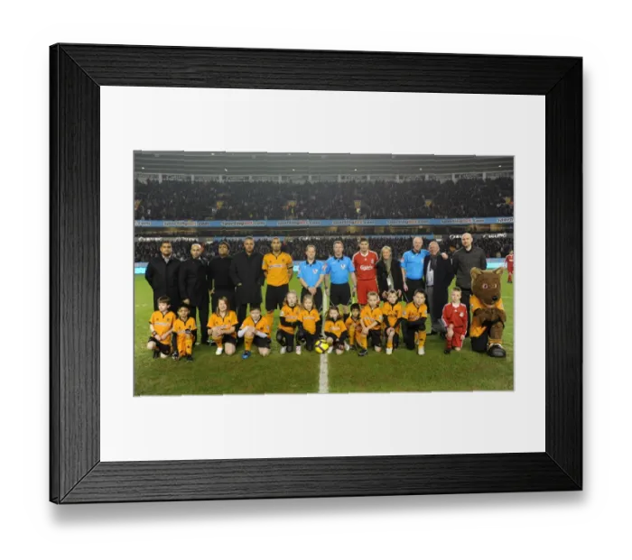 Framed Print : Mascot Showdown: Wolverhampton Wanderers vs Liverpool - A Thrilling Premier League Clash
