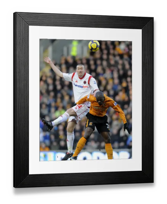 Framed Print : David Jones vs George Boateng: A Premier League Showdown - Hull City vs Wolverhampton Wanderers
