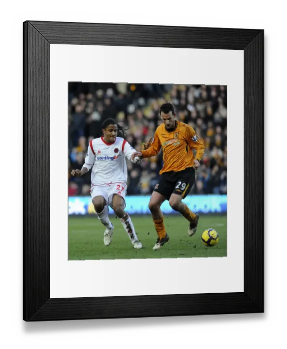 Framed Print : Mancienne vs. Vennegoor-Hesselink: A Premier League Face-Off - Hull City vs. Wolverhampton Wanderers Framed Print : Mancienne vs. Vennegoor-Hesselink: A Premier League Face-Off - Hull City vs. Wolverhampton Wanderers