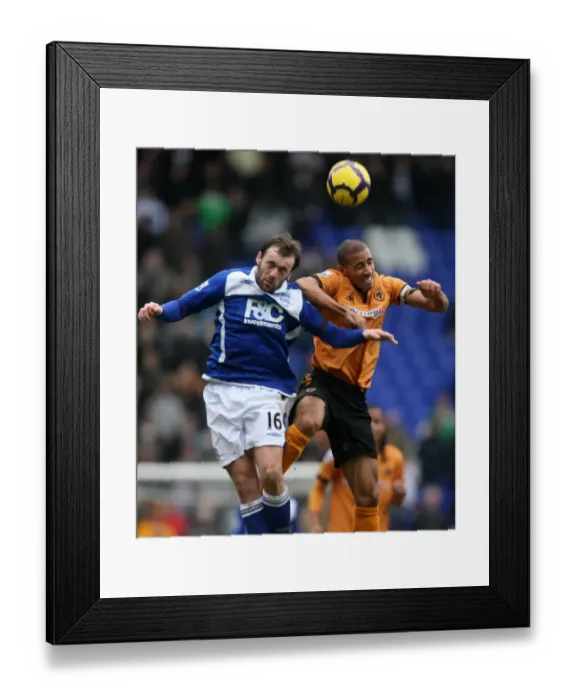Framed Print : Clash of the Midlands: Premier League Showdown - McFadden vs. Henry: A Battle Between Birmingham City and Wolverhampton Wanderers