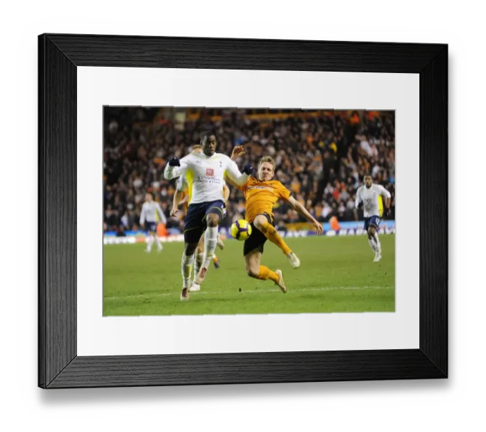 Framed Print : Wolverhampton Wanderers vs. Tottenham Hotspur: A Premier League Showdown - Doyle vs. Bassong Framed Print : Wolverhampton Wanderers vs. Tottenham Hotspur: A Premier League Showdown - Doyle vs. Bassong