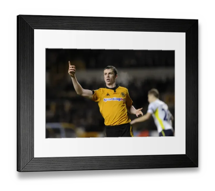 Framed Print : Wolverhampton Wanderers vs. Tottenham Hotspur: Kevin Foley's Intense Action in Barclays Premier League Soccer