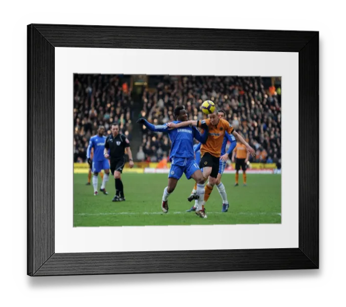 Framed Print : Clash of the Midfield Titans: Mikel vs. Jones in Wolverhampton Wanderers vs Chelsea Football Match Framed Print : Clash of the Midfield Titans: Mikel vs. Jones in Wolverhampton Wanderers vs Chelsea Football Match