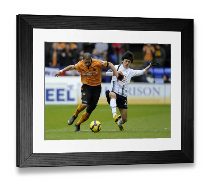 Framed Print : Clash of the Midfield Titans: Guedioura vs. Lee - Bolton vs. Wolverhampton Wanderers Premier League Showdown Framed Print : Clash of the Midfield Titans: Guedioura vs. Lee - Bolton vs. Wolverhampton Wanderers Premier League Showdown