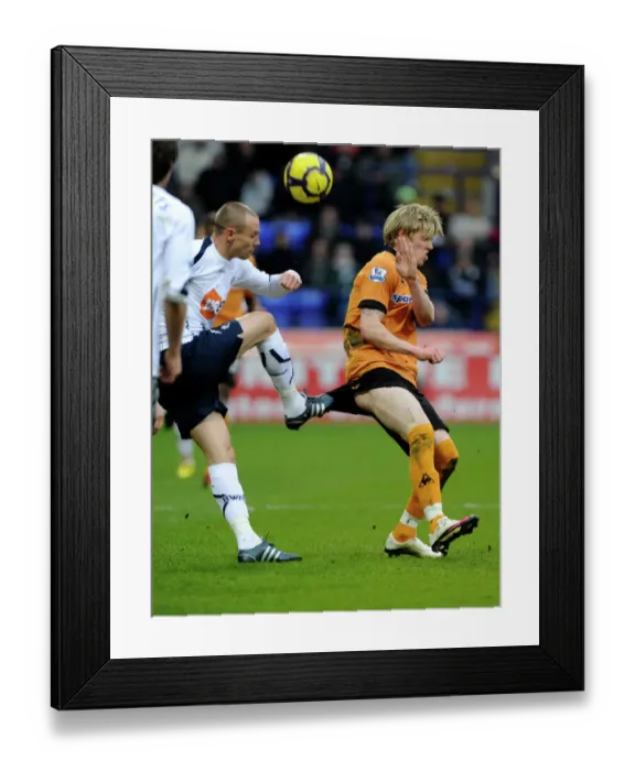 Framed Print : Clash of Titans: Andrew Keogh vs Matt Taylor - Premier League Battle: Wolverhampton Wanderers vs Bolton Wanderers Framed Print : Clash of Titans: Andrew Keogh vs Matt Taylor - Premier League Battle: Wolverhampton Wanderers vs Bolton Wanderers
