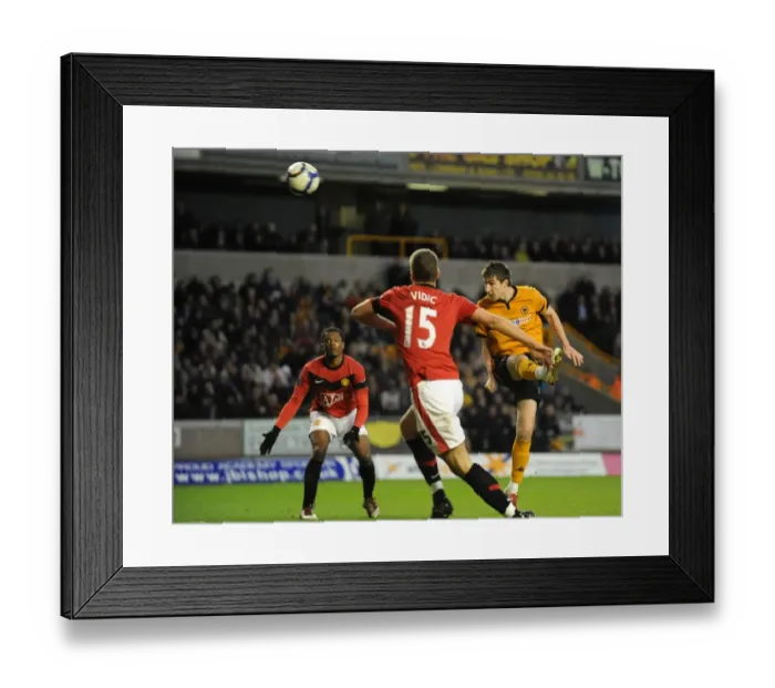 Framed Print : Stephen Ward Charges Towards Manchester United's Goal in Premier League Showdown (Wolves vs. Manchester United, 06-03-10) Framed Print : Stephen Ward Charges Towards Manchester United's Goal in Premier League Showdown (Wolves vs. Manchester United, 06-03-10)