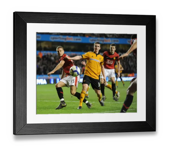 Framed Print : Clash of Titans: Nemanja Vidic vs. Kevin Foley - Wolves vs. Manchester United, Premier League (2010) Framed Print : Clash of Titans: Nemanja Vidic vs. Kevin Foley - Wolves vs. Manchester United, Premier League (2010)