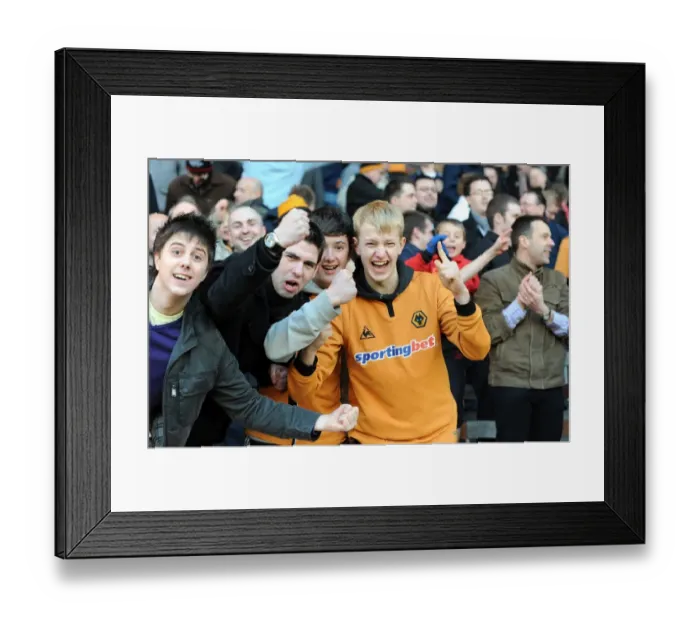 Framed Print : Euphoric Wolves Fans Celebrate Premier League Victory on the Pitch: Burnley vs. Wolverhampton Wanderers Framed Print : Euphoric Wolves Fans Celebrate Premier League Victory on the Pitch: Burnley vs. Wolverhampton Wanderers