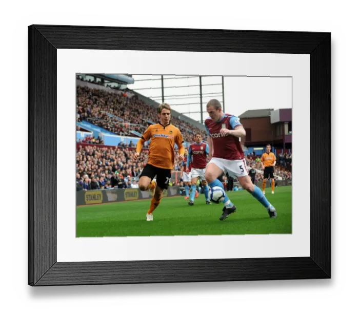 Framed Print : Clash of Titans: Dunne vs. Doyle - Aston Villa vs. Wolverhampton Wanderers, Premier League Showdown