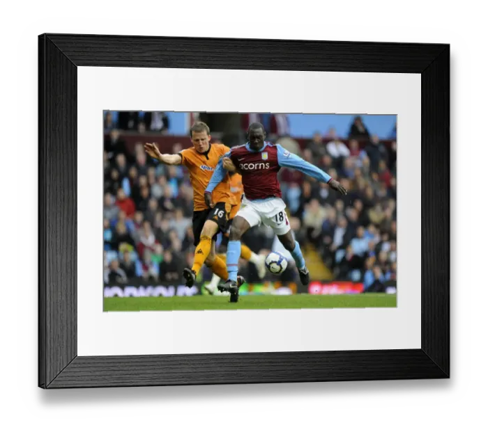 Framed Print : Clash of Titans: Berra vs. Heskey - Aston Villa vs. Wolverhampton Wanderers, Premier League Showdown Framed Print : Clash of Titans: Berra vs. Heskey - Aston Villa vs. Wolverhampton Wanderers, Premier League Showdown