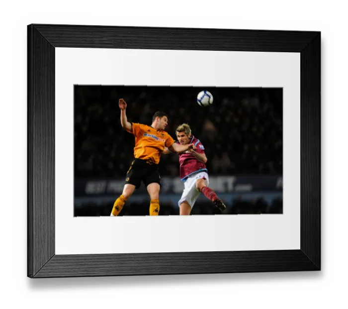 Framed Print : Clash of Titans: West Ham United vs. Wolverhampton Wanderers - Matthew Jarvis vs. Valon Behrami, Barclays Premier League (23-3-10)