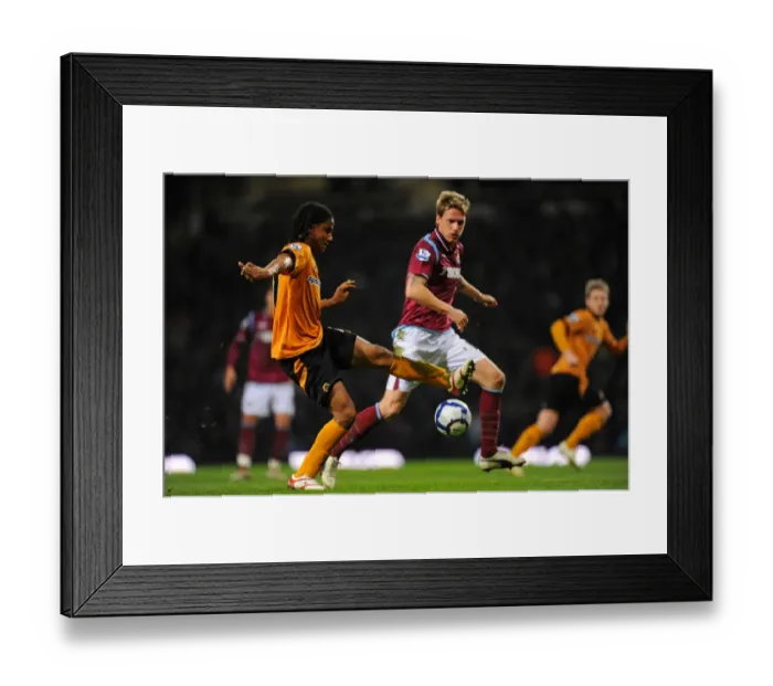 Framed Print : Mancienne vs. Kovac: A Premier League Showdown - West Ham United vs. Wolverhampton Wanderers (23-3-10) Framed Print : Mancienne vs. Kovac: A Premier League Showdown - West Ham United vs. Wolverhampton Wanderers (23-3-10)