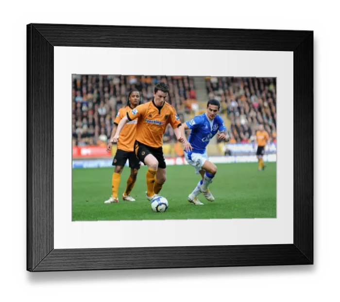 Framed Print : Clash of Titans: Kevin Foley vs Tim Cahill - Wolverhampton Wanderers vs Everton (Premier League, 27-03-10) Framed Print : Clash of Titans: Kevin Foley vs Tim Cahill - Wolverhampton Wanderers vs Everton (Premier League, 27-03-10)