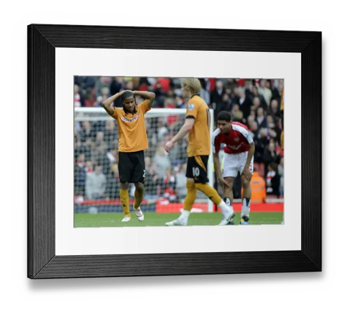 Framed Print : Michael Mancienne's Disappointment: Arsenal's Premier League Victory Over Wolverhampton Wanderers Framed Print : Michael Mancienne's Disappointment: Arsenal's Premier League Victory Over Wolverhampton Wanderers
