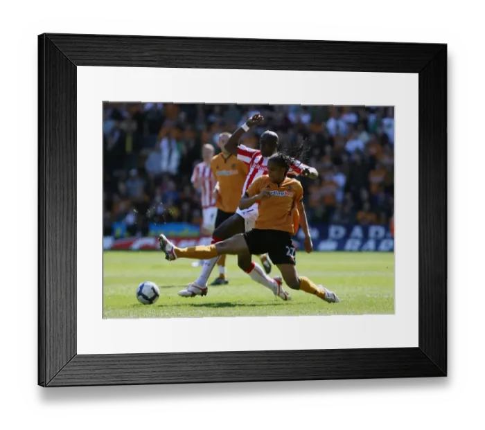 Framed Print : Battle of the Midfield: Sidibe vs Mancienne in Wolverhampton Wanderers vs Stoke City (April 11, 2010) - Barclays Premier League Framed Print : Battle of the Midfield: Sidibe vs Mancienne in Wolverhampton Wanderers vs Stoke City (April 11, 2010) - Barclays Premier League
