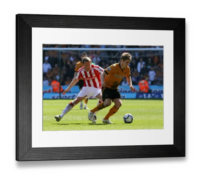 Framed Print : A Tense Clash: Collins vs. Doyle in the Barclays Premier League - Wolverhampton Wanderers vs. Stoke City (11-04-10) Framed Print : A Tense Clash: Collins vs. Doyle in the Barclays Premier League - Wolverhampton Wanderers vs. Stoke City (11-04-10)